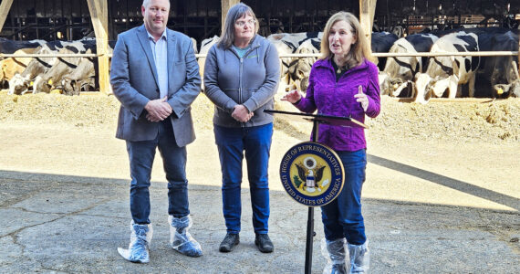 Rep. Kim Schrier (D-8) held a press conference with local dairy farmer Leann Krainick and Alan Huttema, interim CEO at Darigold. Photo by Ray Miller-Still