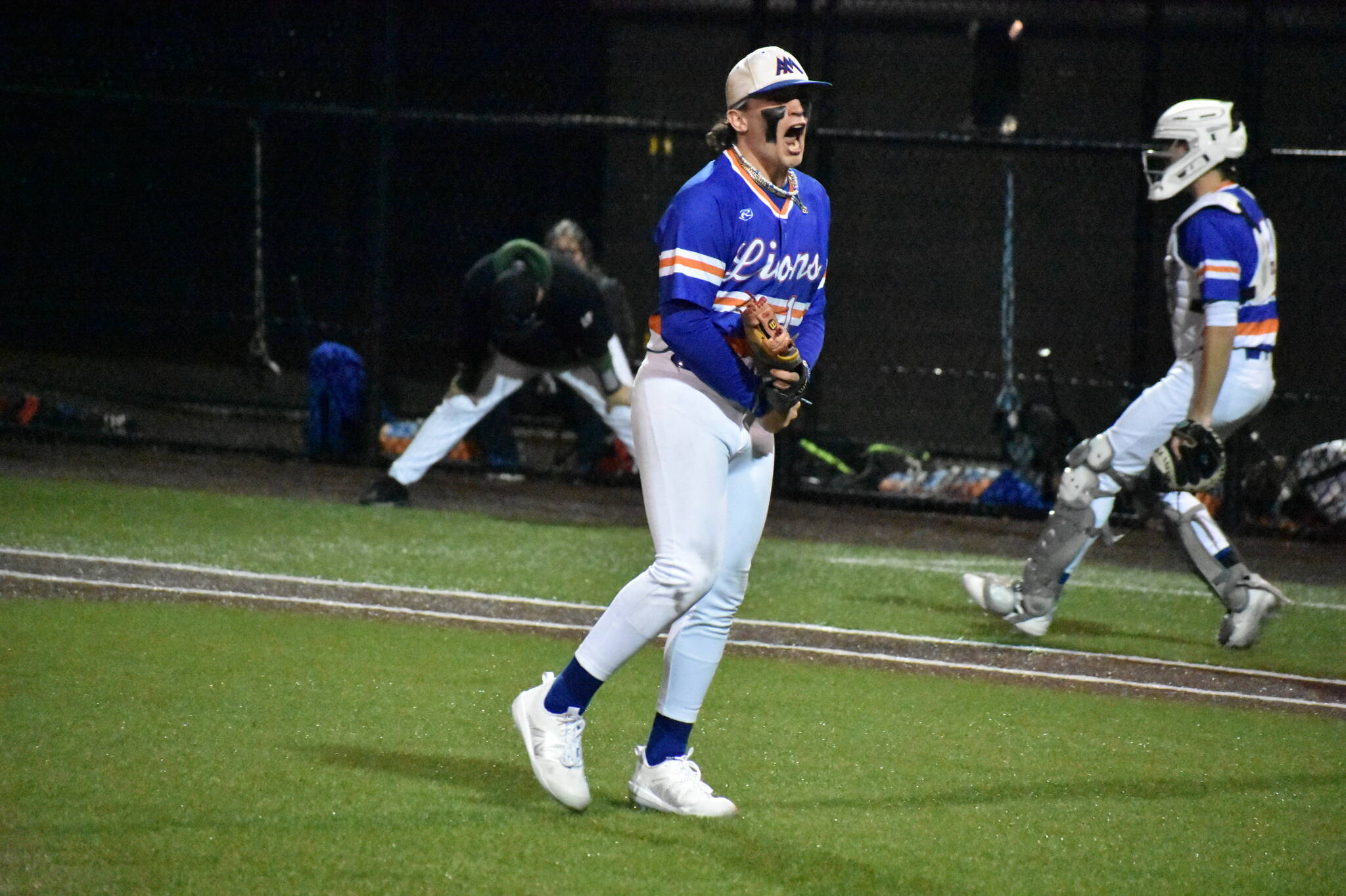 Auburn Mountainview pitcher Gino Trippy screams towards the Auburn dugout after closing out an inning with a double play. Ben Ray / The Reporter