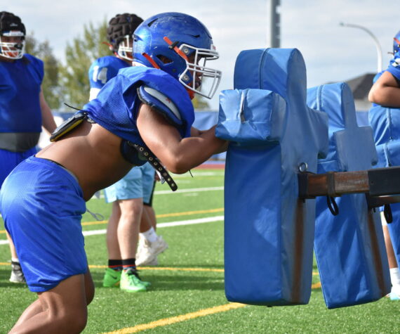 Auburn Mountainview player works the sled. (File photo)