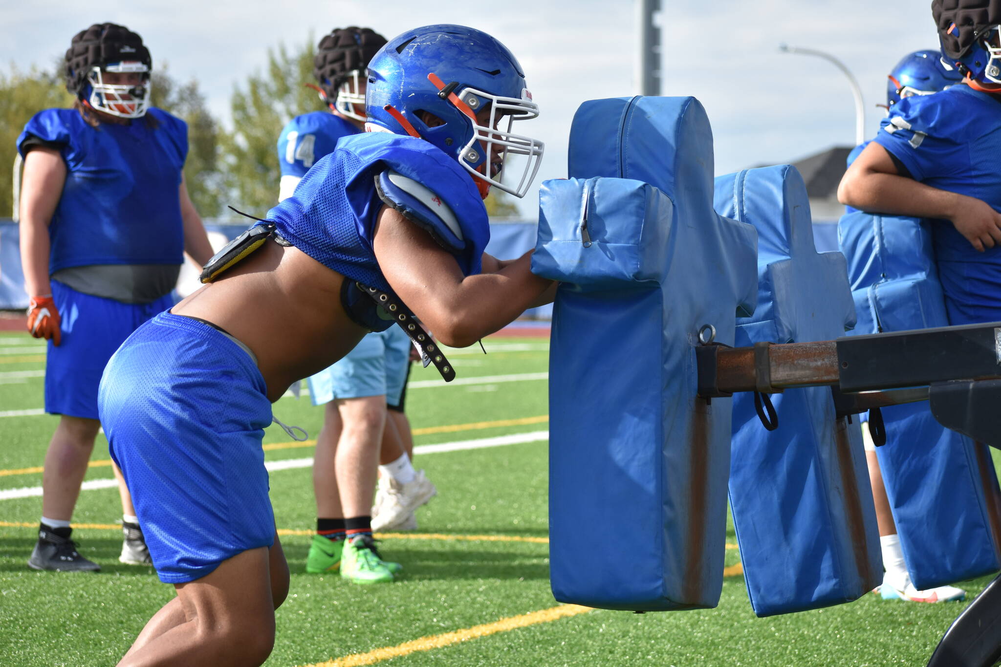 Auburn Mountainview player works the sled. (File photo)