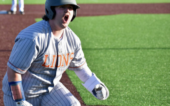 Danner Philbrick gives a yell after a leadoff single and error in the seventh inning. Ben Ray / The Reporter