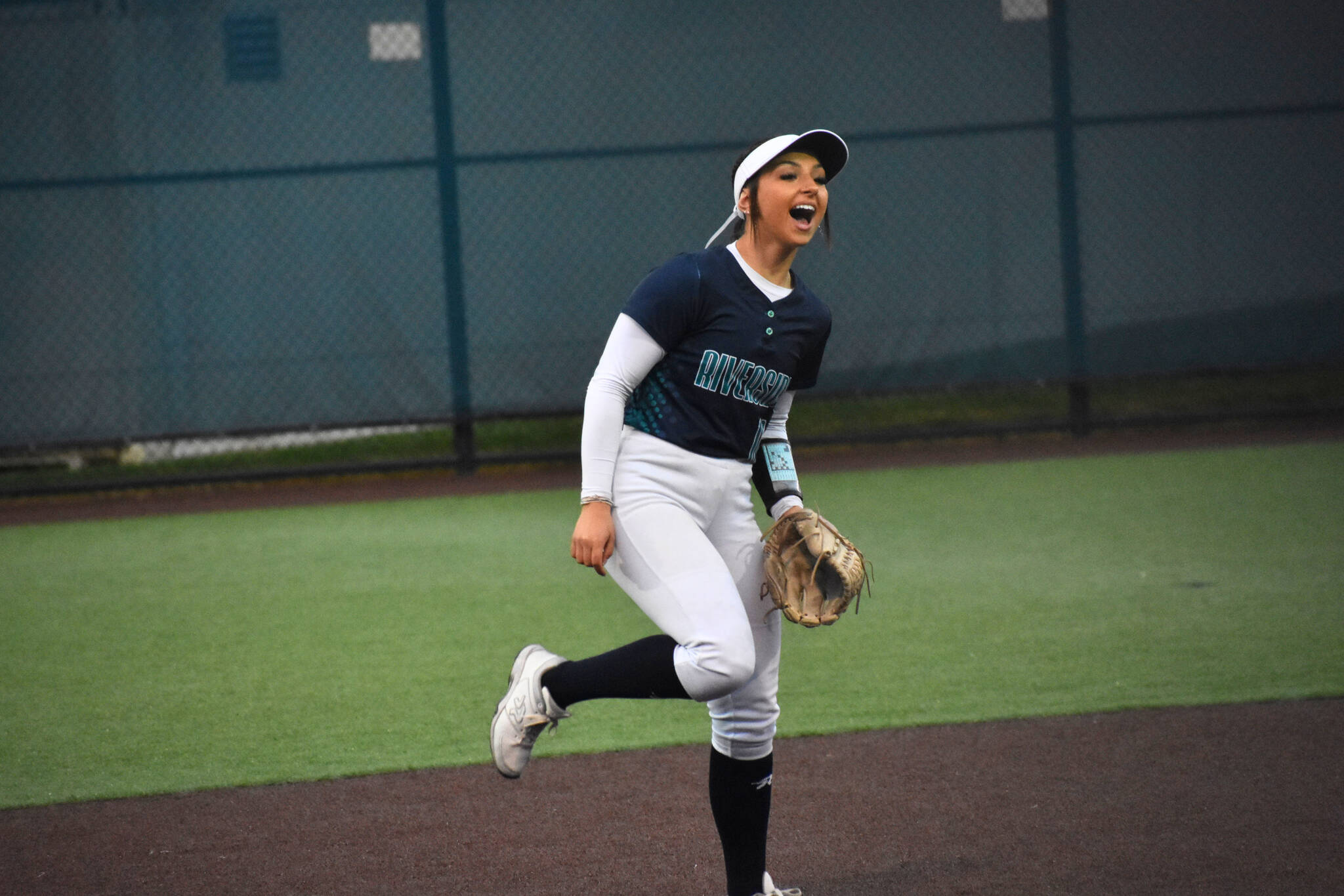 Bailey Brader celebrates a strikeout with a scream in support of Danica Butler. Ben Ray / The Reporter