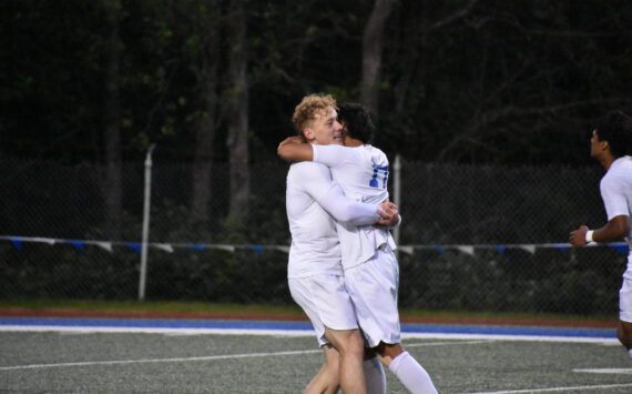 Davyd Fedina and Benji Toscano celebrate the Lions’ third goal of the night. Ben Ray / The Reporter