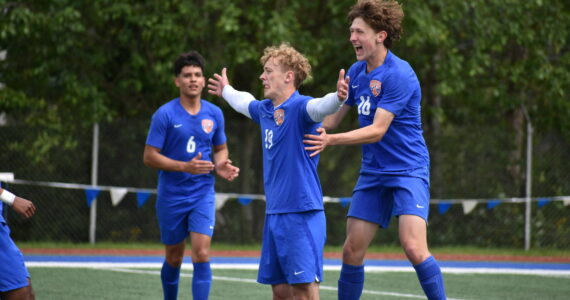 NPSL 3A Player of the Year Davyd Fedina gets swarmed in the state tournament. Ben Ray / The Reporter