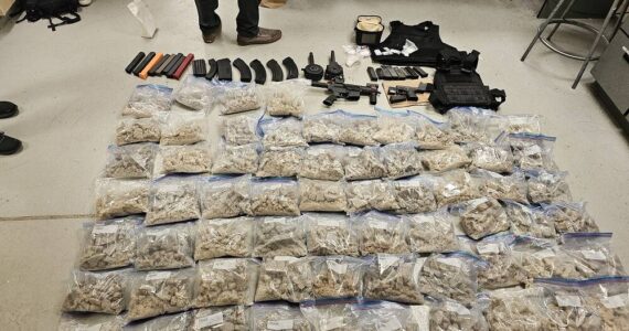 Police found a firearm and firearms parts, ammunition, body armor, more than 134 pounds of MDMA, more than 2,300 fentanyl pills, and more in a 33-year-old Auburn man’s apartment while executing a search warrant. (Courtesy of the U.S. Department of Justice)