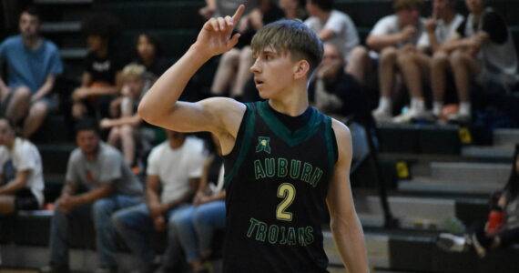Carter Hansen has taken a larger role for the Trojans this summer. Ben Ray / The Reporter