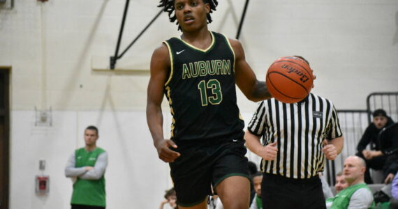 Miles Henry scored 25 points in the win for Auburn over Kentwood. Ben Ray / The Reporter