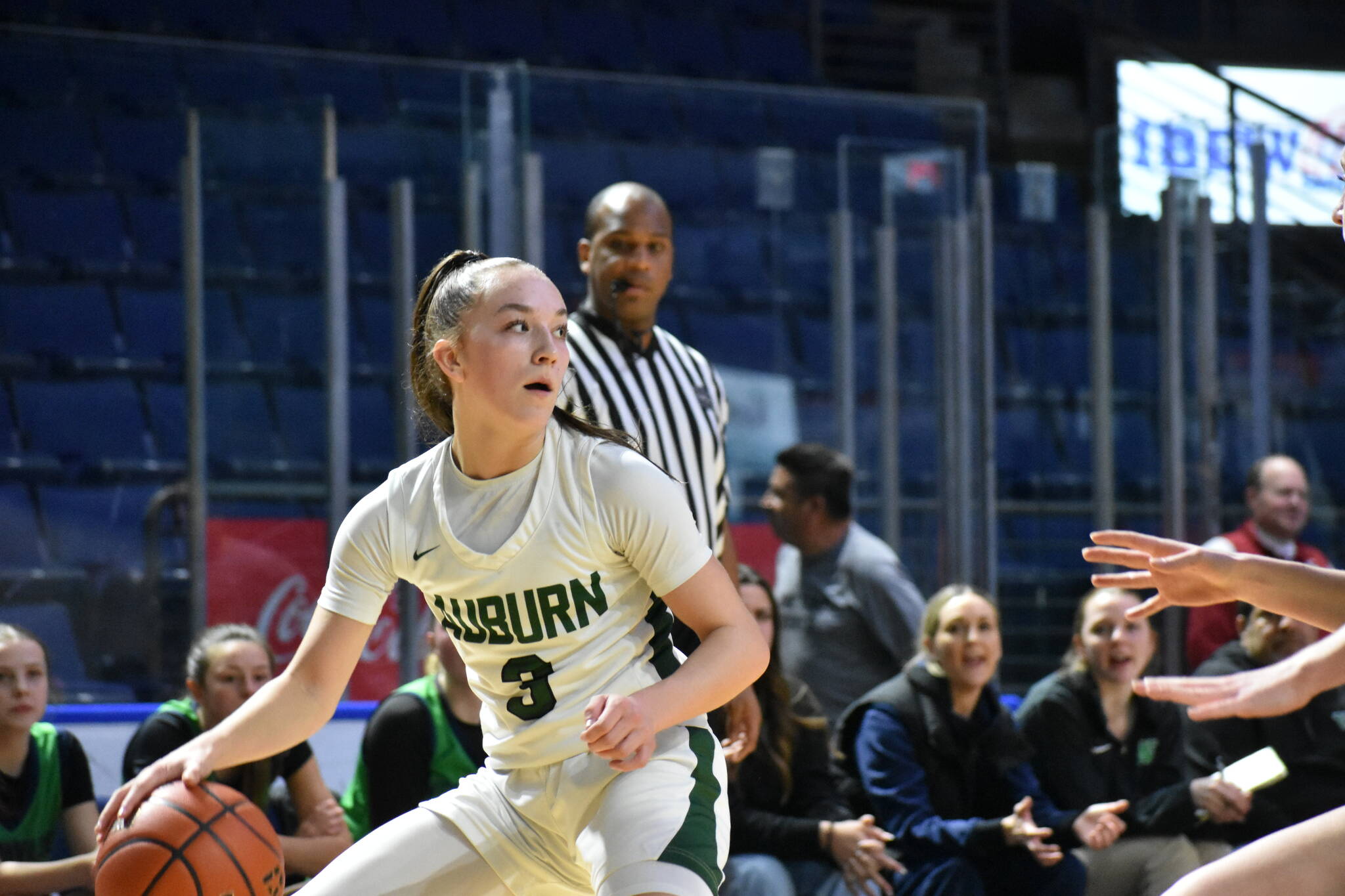 Avery Hansen looks for a teammate against Woodinville at the ShoWare Center. Ben Ray / The Reporter