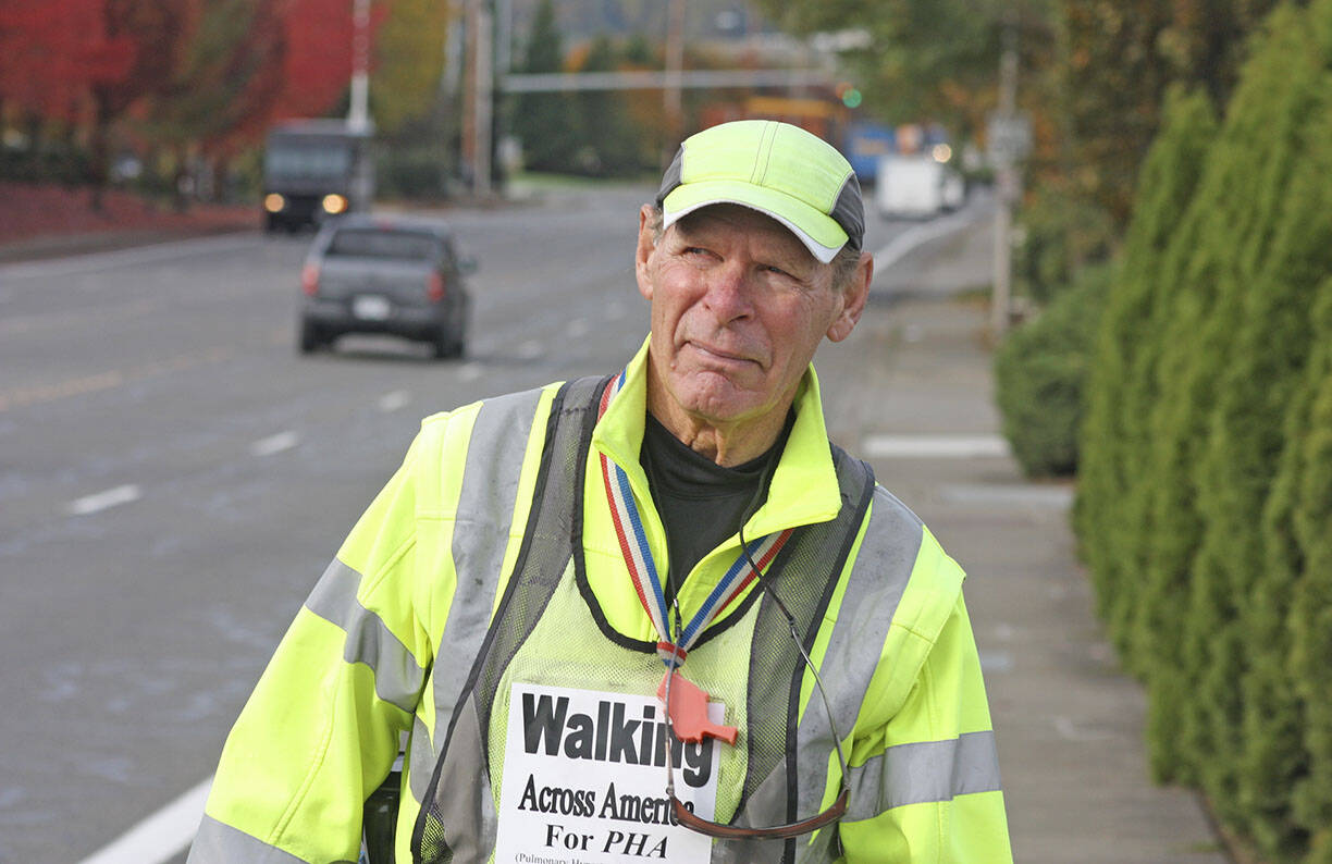 Don Stevenson follows South 196th Street en route to the Interurban Trail in Kent. File photo.