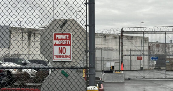 A “no trespassing” sign outside of the Northwest ICE Processing Center in Tacoma. (Grace Deng/Washington State Standard)