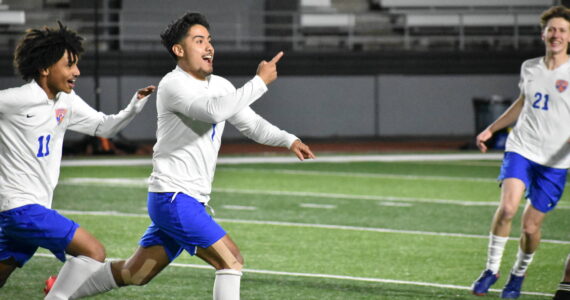 Benji Toscano celebrates his goal against Kent-Meridian. Ben Ray / The Reporter