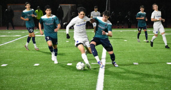 Tima Vereminy battles for the ball against Tahoma. Ben Ray / The Reporter