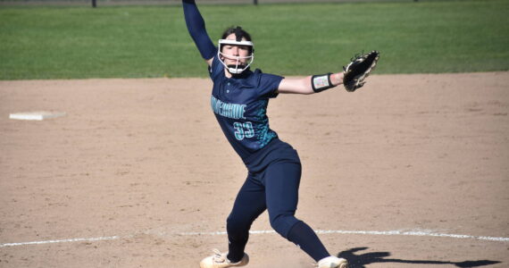 Makenna Vircks pitches against Kentridge at Kent Service Ballfields. Ben Ray / The Reporter