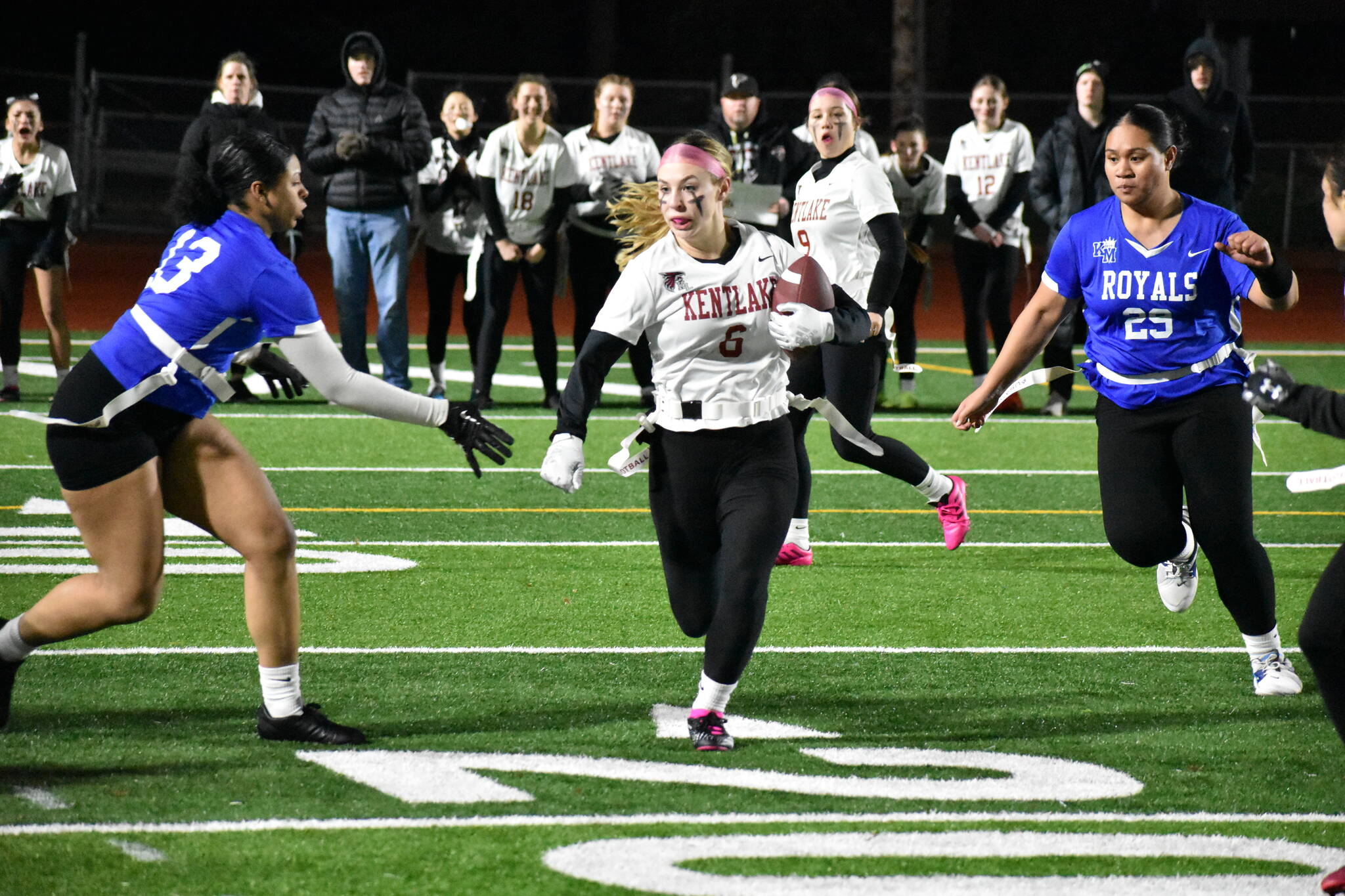 Kentlake junior Kaylee Guiles finds a hole in against Kent-Meridian. Ben Ray / The Reporter