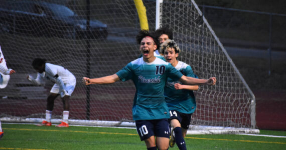 Auburn Riverside striker Aidan Marcianiak scores the game’s first goal. Ben Ray / The Reporter