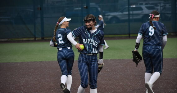 Kylee Curtis smiles after turning a double play. Ben Ray / The Reporter
