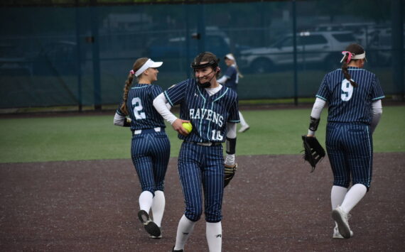 Kylee Curtis smiles after turning a double play. Ben Ray / The Reporter