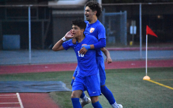Sergio Mercado leaps on the shoulders of Pablo Montiel after he scores his first goal of the night. Ben Ray / The Reporter