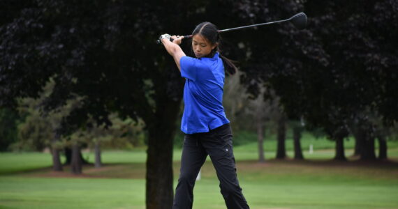 Lions sophomore Esther Yu takes her tee shot on the third hole at the Auburn Golf Course. Ben Ray / The Reporter