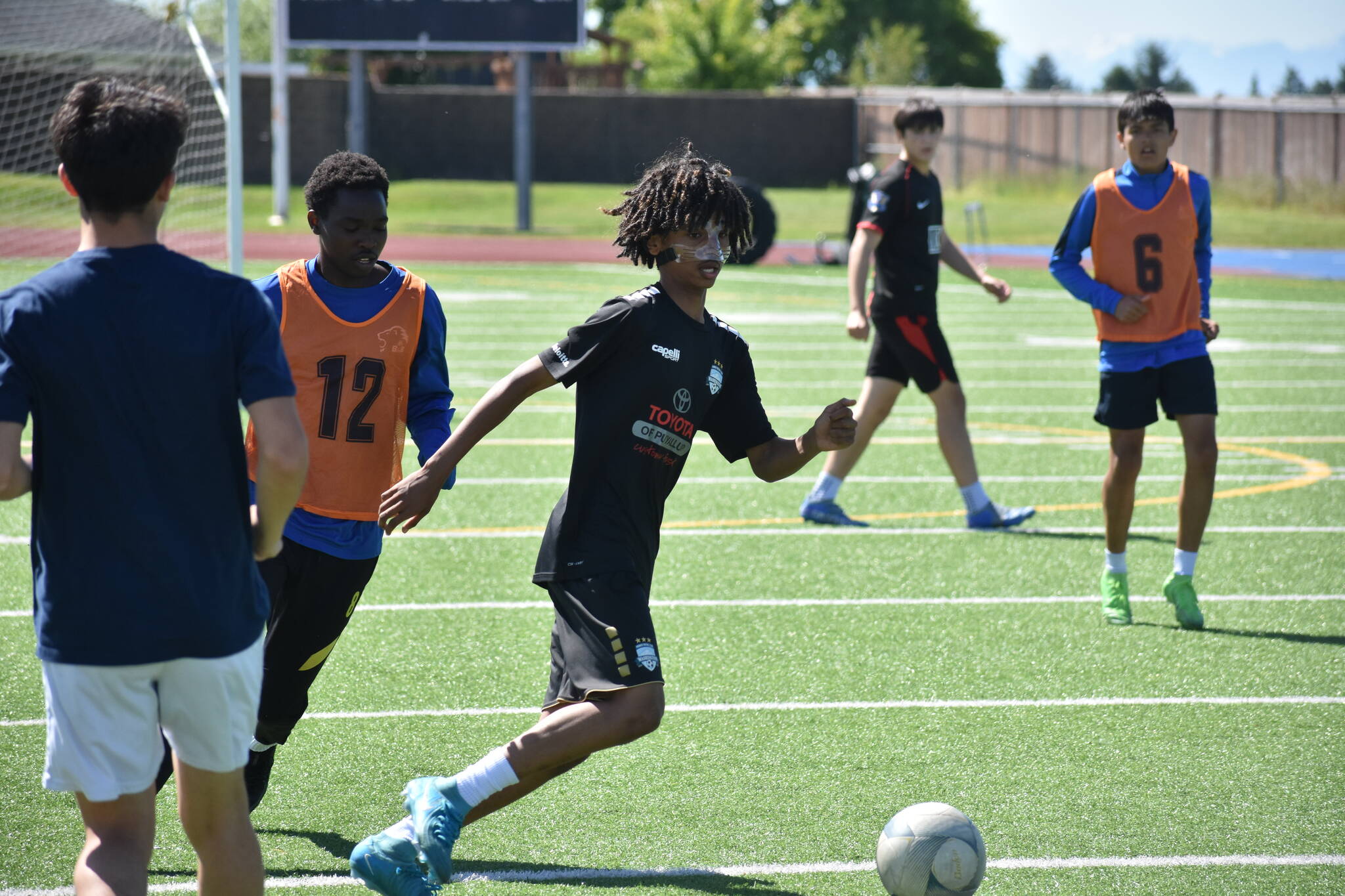 Benjamin Yitbarek controls the ball at training for the Lions. Ben Ray / The Reporter