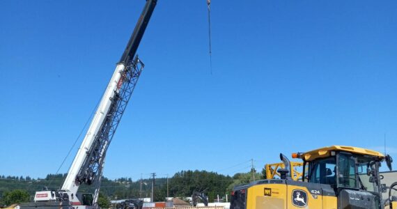 Sound Transit will add a new tower crane to the Sound Transit parking garage construction site 1st Street Northwest and A Street Northwest on June 3. Photo by Robert Whale/Auburn Reporter