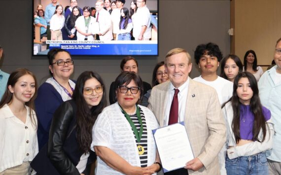 Estela Ortega, El Centro de la Raza staff, and her family. Courtesy photo