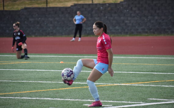 Kailalani Ahuna takes a touch during pre-game warm-ups. Ben Ray / The Reporter