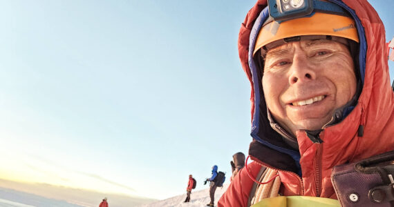 It takes Brent Okita and his fellow climbers about 12 hours hours to ascend Mount Rainier from Camp Muir. Now at the top, they've got about 10 more hours to go to reach the bottom. Photo courtesy Brent Okita