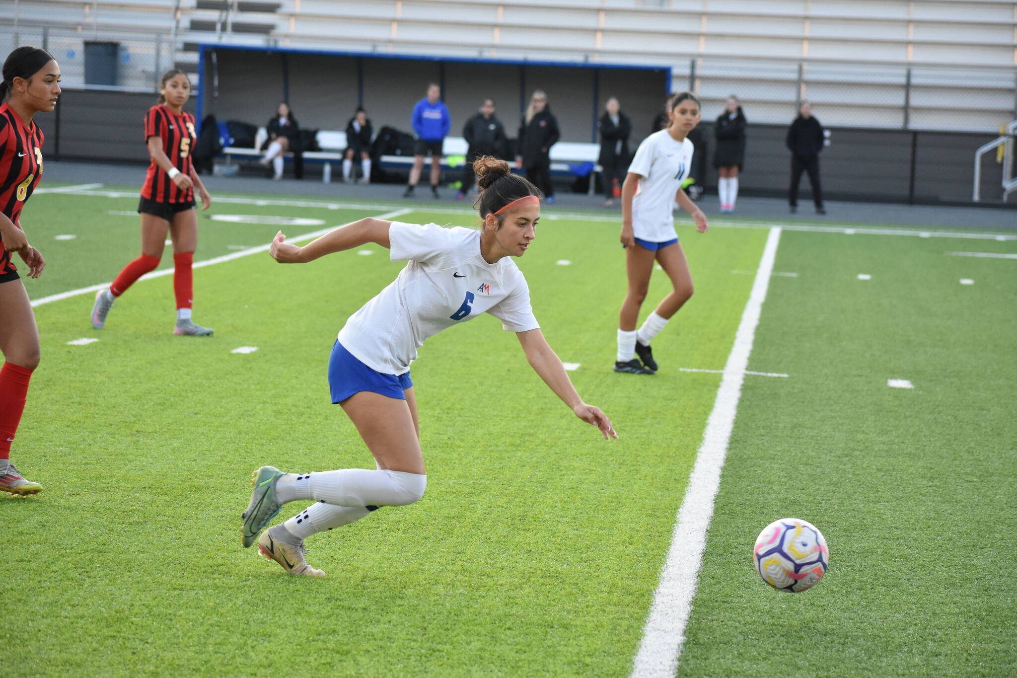 Emily DeLaCruz chases the ball down for Auburn Mountainview. Ben Ray / The Reporter