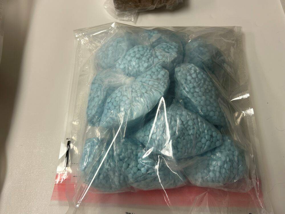 A drug stash location in Centralia had 25 kilos of suspected fentanyl powder, more than 90,000 fentanyl pills and two dozen firearms. Photo provided by the office of U.S. Attorney Charles Neil Floyd