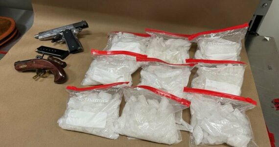Firearms and methamphetamine allegedly seized from the arrest. Courtesy photo.