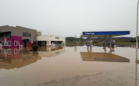 The Chevron station at 5148 Auburn Way N., Auburn, as seen on Thursday, Dec. 11. The gas station is nearly fully submerged, with gasoline mixed with water, leaving a pungent smell. Photo by Joshua Solorzano/Sound Publishing