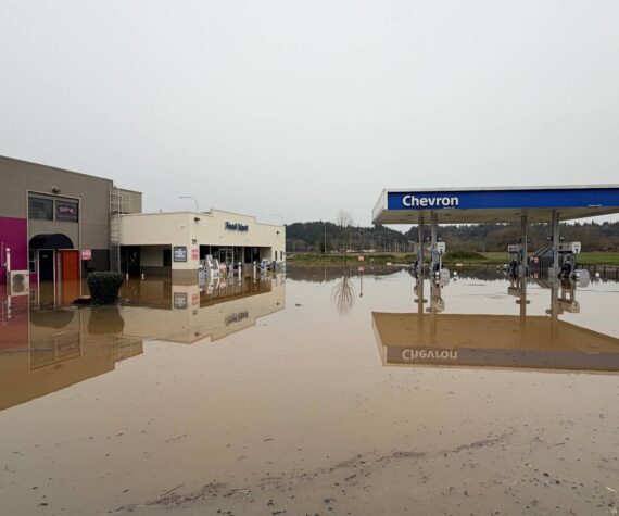 The Chevron station at 5148 Auburn Way N., Auburn, as seen on Thursday, Dec. 11. The gas station is nearly fully submerged, with gasoline mixed with water, leaving a pungent smell. Photo by Joshua Solorzano/Sound Publishing