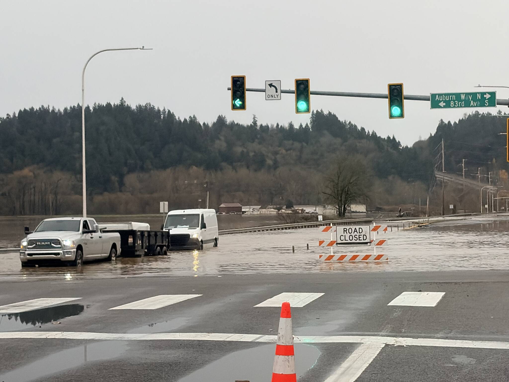 The flooded intersection of Auburn Way North and South 52nd Street on Thursday, Dec. 11. Photo by Joshua Solorzano/Sound Publishing
