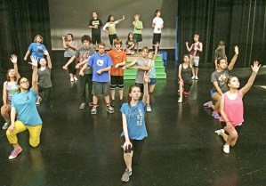 The cast of 'Once On This Island' rehearses for opening night