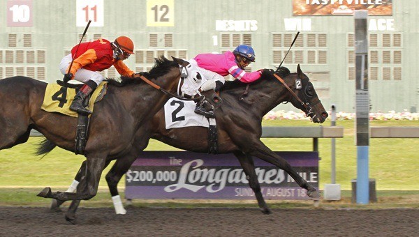 Saddleranch and jockey David G. Lopez hold off Assessment in the $21