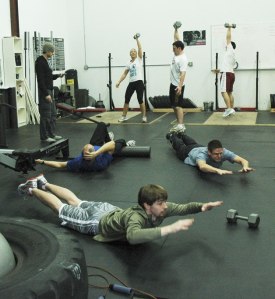 David Weaver monitors an exercise class at the Inner Icon Fitness studio in north Auburn. The Weavers offer individual and group sessions for men and women of all ages and abilities.