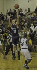 Auburn Riverside's Ryan Rogers shoots a 3-pointer against Auburn this past Friday.