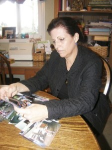 Suzanne Waltman sifts through photos of her son