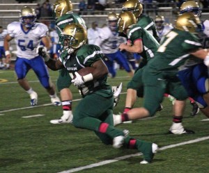 Auburn sophmore Ercle Terrell scampers for a first down against Tahoma on Friday.