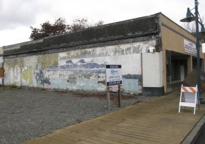 Civic leaders are urging the owner to address a dilapidated building on West Main Street.