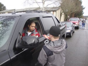 Motorists line up patiently for a chance to fill up their gas tanks during a KUBE 93/Arco AM/PM promotion.