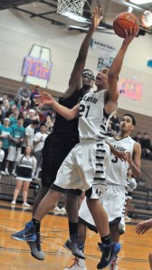 Auburn Riverside's Julian Gulchuk goes up for a shot against North Thurston.
