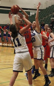 Auburn Mountainview senior Aalia Braboy tries to get a shot off between two Seattle Prep defenders.