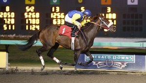 Camille and jockey Francisco Duran dominate the Friday feature race at Emerald Downs.