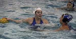 Savanna Warner in the pool against Curtis High School in the Washington State Girls High School Water Polo Championships.