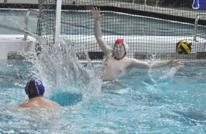 Auburn Mountainview's Hunter Arnold scores a goal over Auburn goalie Jacob Mclnerny.