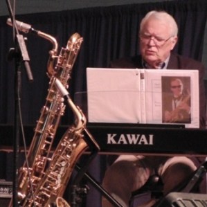 Barney McClure playing from his Mark Lewis composition book at the Juan de Fuca Festival of the Arts on Saturday.