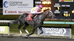 Seadrifter and Julien Couton coast home in the Friday feature race for older fillies and mares at Emerald Downs.