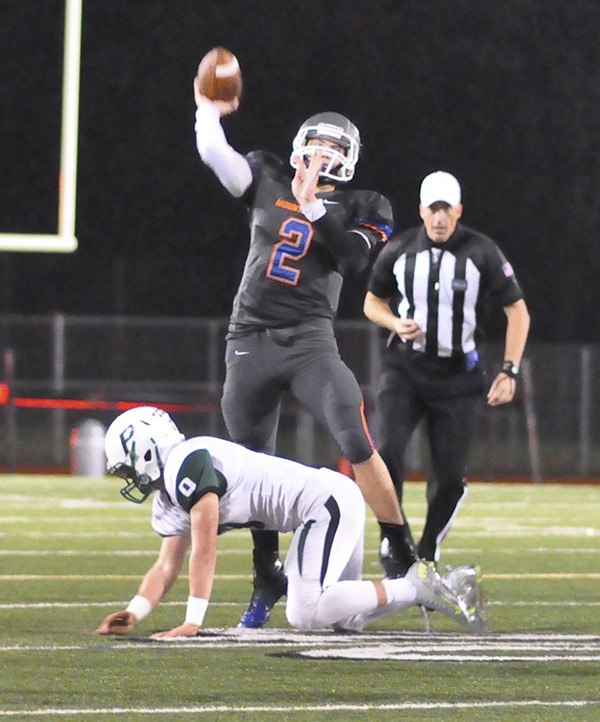 Auburn Mountainview quarterback Gresch Jensen in action against Peninsula.